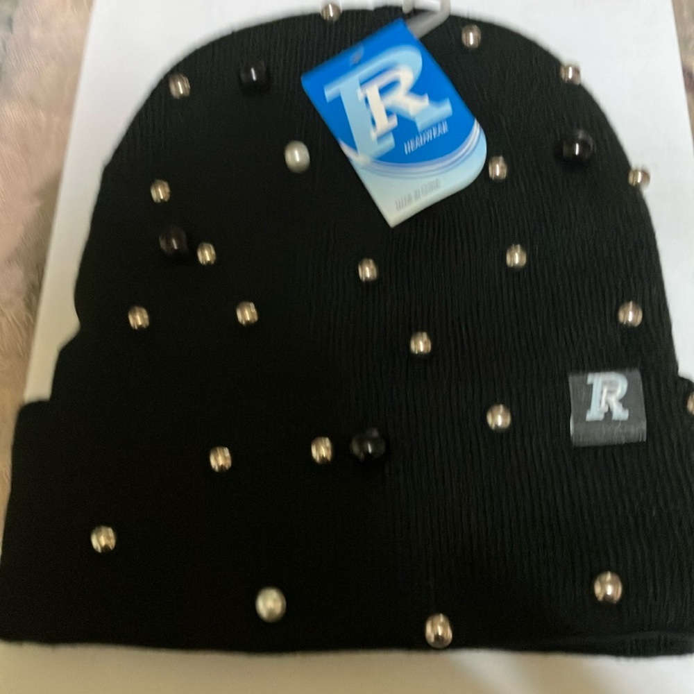 Black winter hat with silver, black, and white pearls